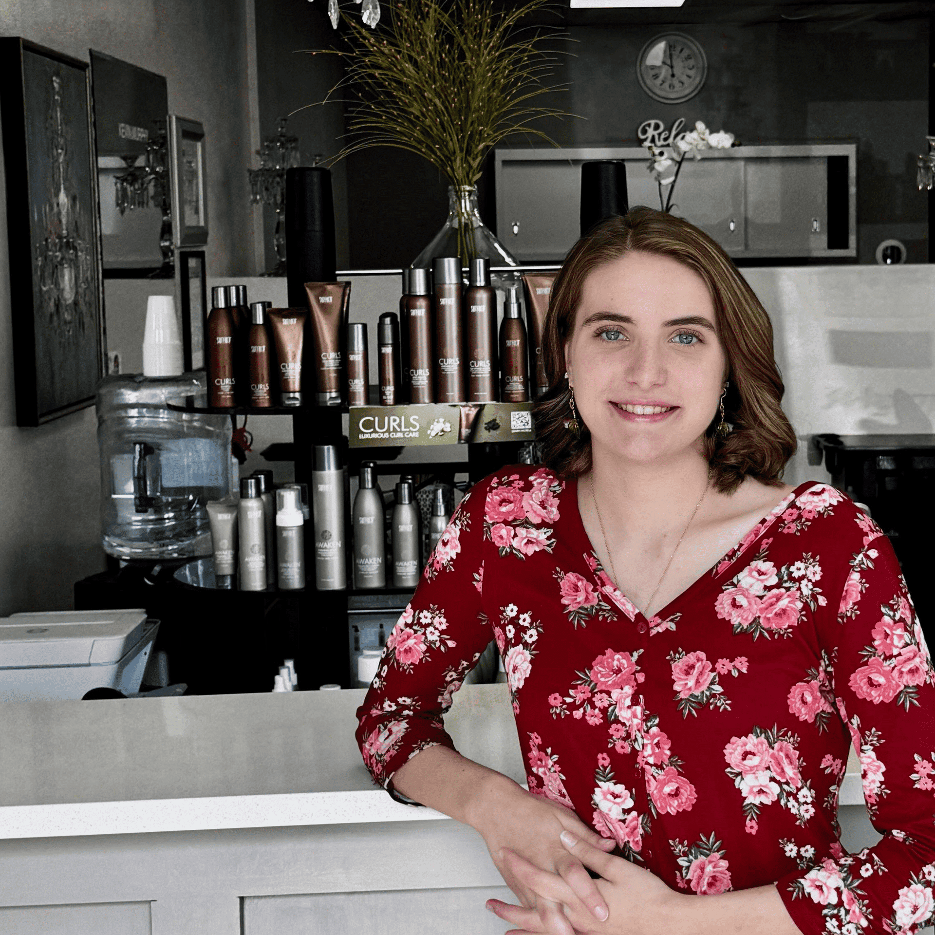 Portrait of Shea Baldwin, a professional stylist at Glitter Hair Salon, showcasing their expertise and style.